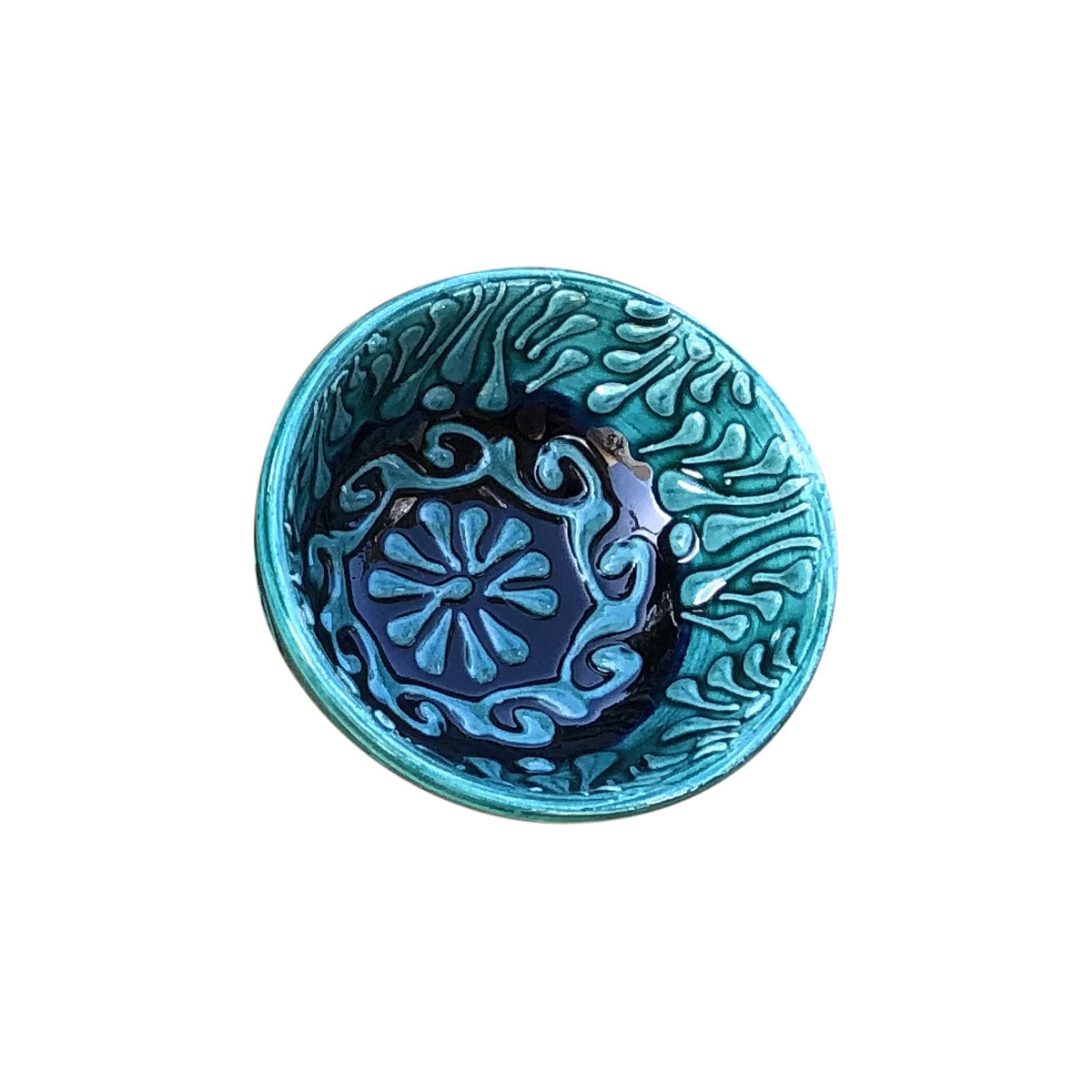 A small blue and black handmade Turkish bowl with a patterned design.