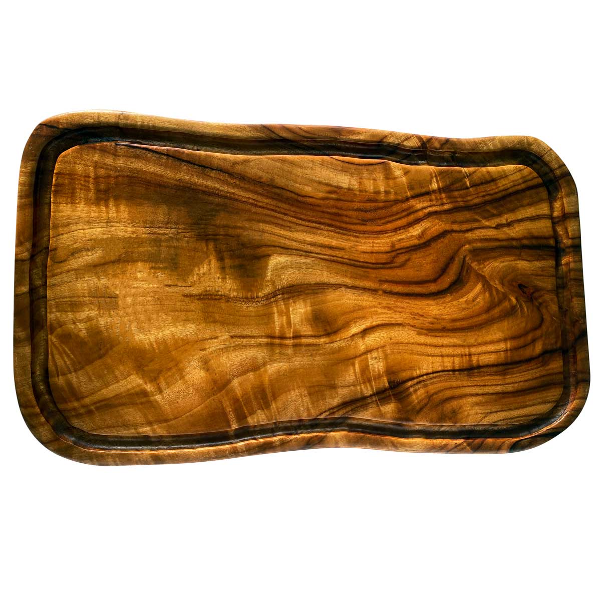 An extra large carving board with a deep groove or juice rail to catch spills, made with camphor laurel timber that has gorgeous colours and grains.